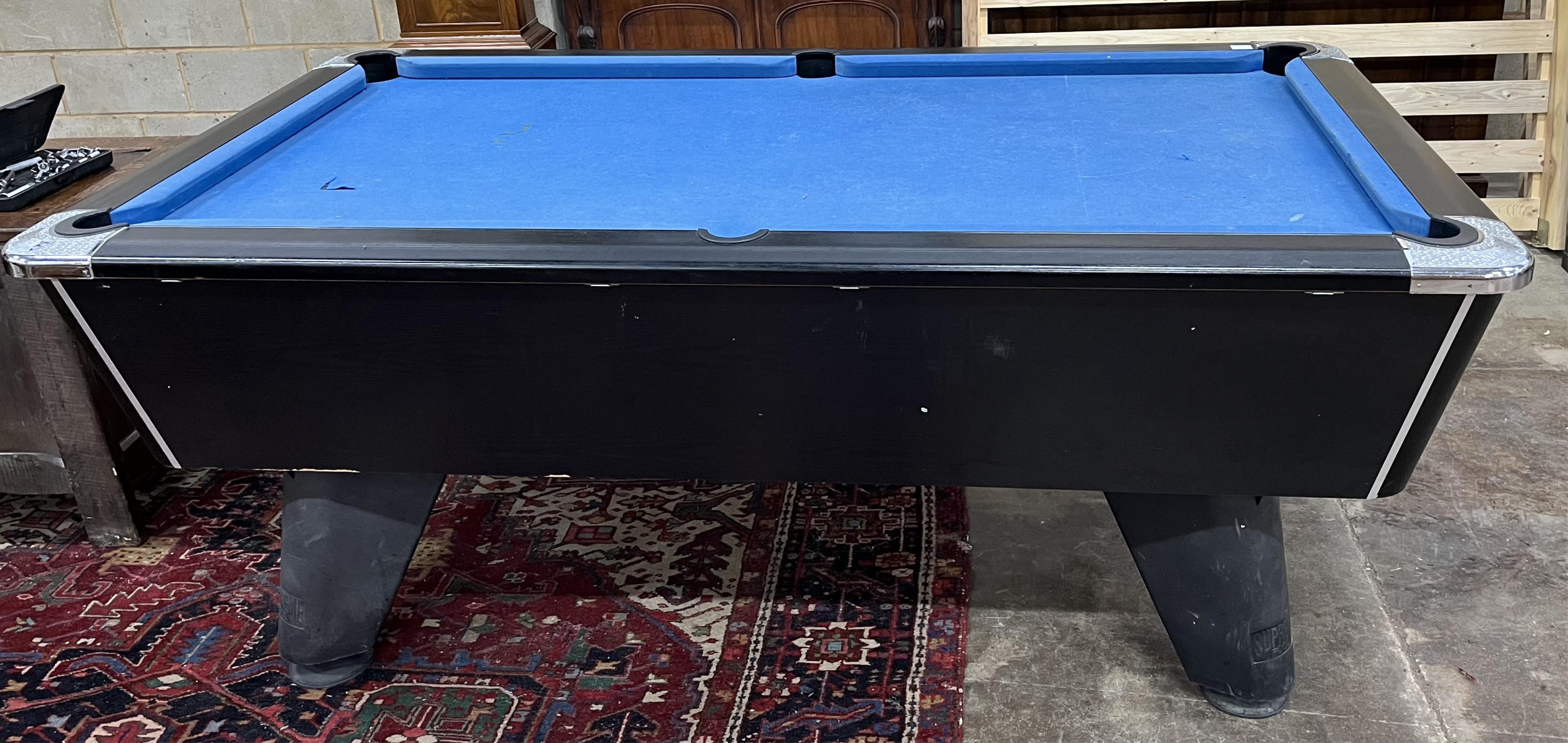 A Supreme pool table with all accessories, width 210cm, depth 120cm, height 82cm. Condition - fair, baize poor